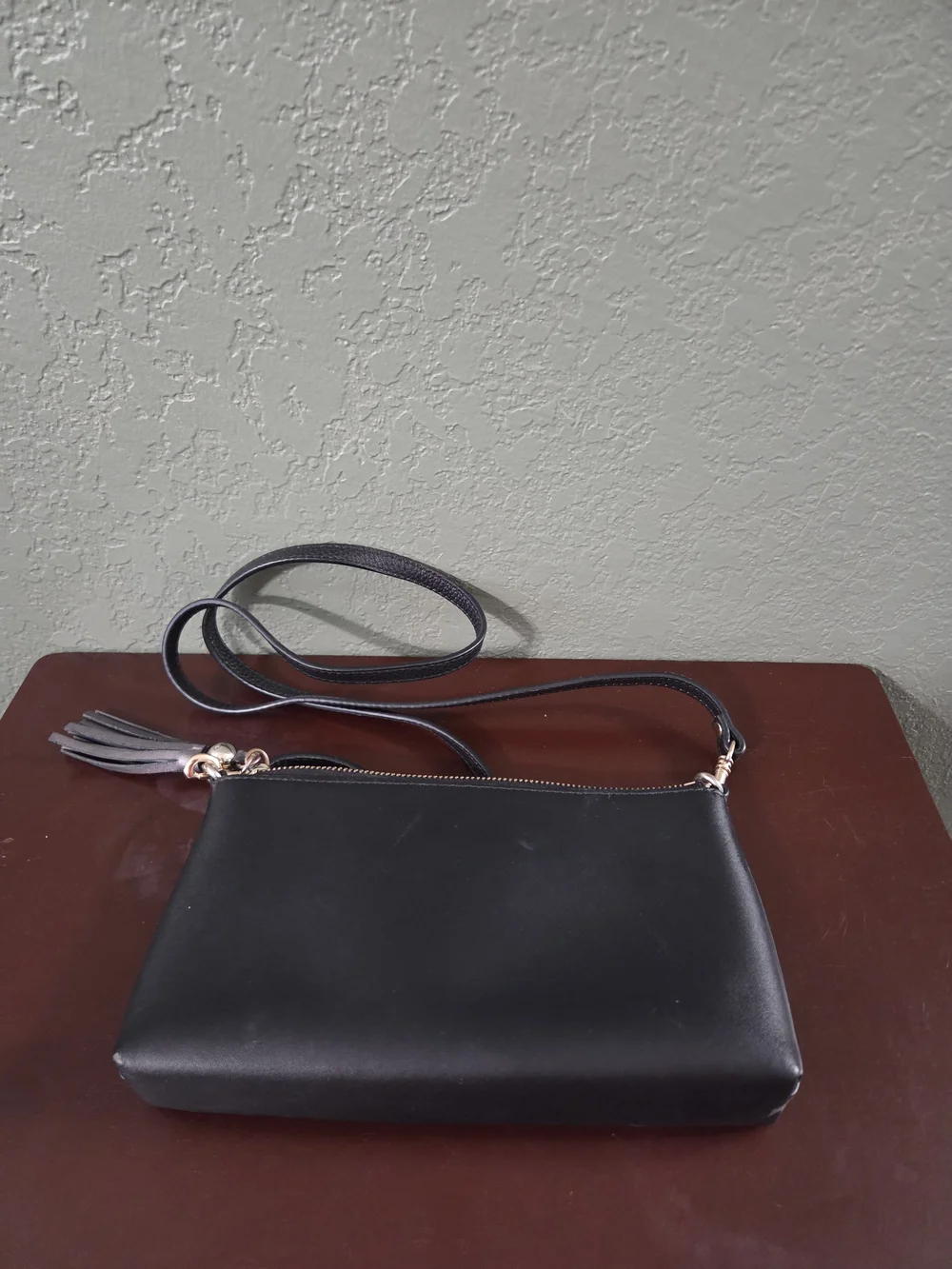 kate spade black leather crossbody with gold hardware